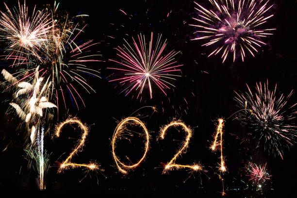 istock 2021 made with sparklers on black background 1291794845