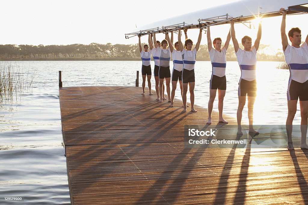 Sportler, die Strecken Ihr Boot - Lizenzfrei Sportmannschaft Stock-Foto