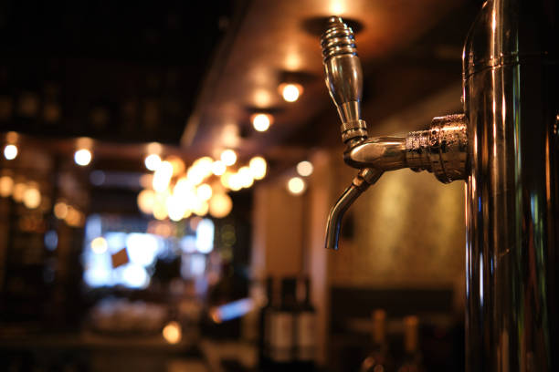 istock Close-up of a beer tap at pub. 1291795688