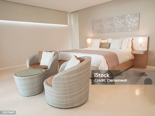 Modern Bedroom In Luxurious Apartment Stock Photo - Download Image Now - Bedroom, Sparse, Architecture