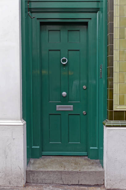 istock Green Door Entrance 1291798948