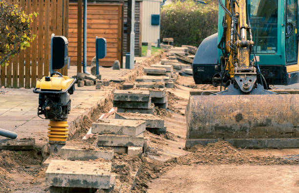 istock Digging the sidewalk for fibre net installation 1291805235