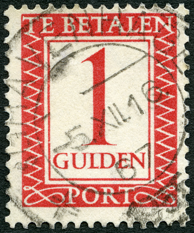 Red 30 pence stamp with postmark