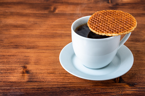 signature authentic Dutch Netherlands sweet dessert waffle caramel honey sugar syrup for coffee tea call Stroopwafel