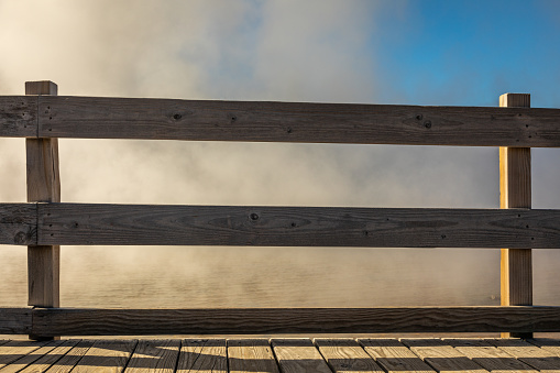 Steam rises from a hot spring in Yellowstone National Park's Lower Geyser Basin.