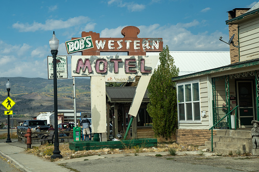 Kremmling, Colorado - September 20, 2020: Sign for Bobs Western Motel, a small hotel with a vintage neon sign
