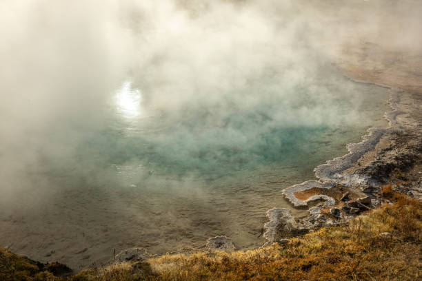 istock Steamy Thermal Pool in Yellowstone National Park 1291811159