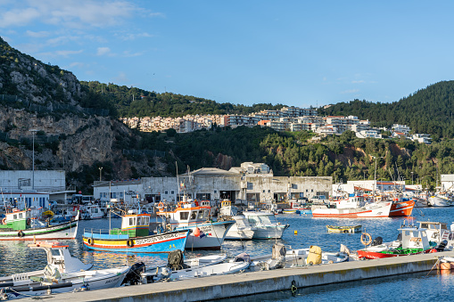 Sesimbra, Portugal - 16 December 2020: view of the harbor and village of Sesimbra in Portugal with colorful fishing boats