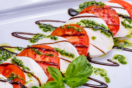 Caprese salad with mozzarella and tomato