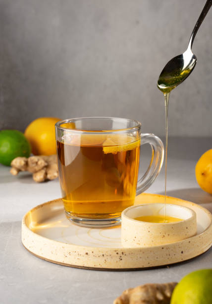 istock Hot herbal tea with ginger, lemon and honey 1291814237