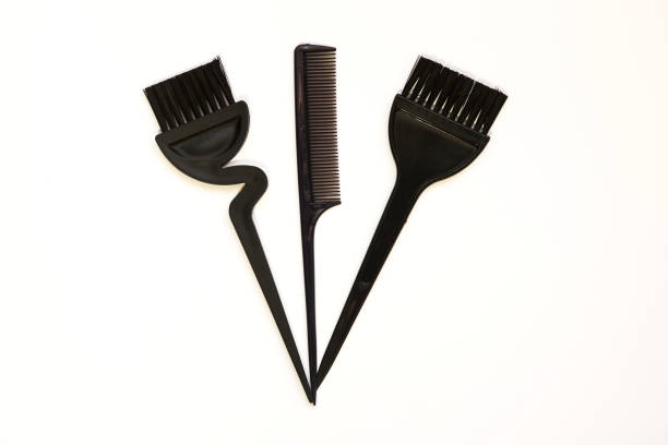 istock black brushes-hair coloring brushes used in salons, on a white background. 1291814665