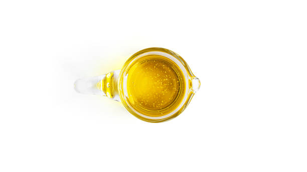 istock Olive oil jar isolated on white background 1291818155