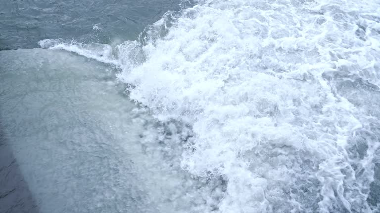 Endless stream of transparent cold water of river rapids