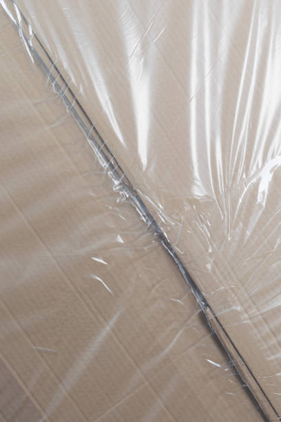 istock close-up of a cardboard box packed in polyethylene 1291823386