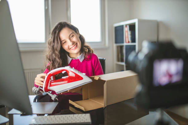 istock Young female influencer making a tutorial of new iron 1291829597