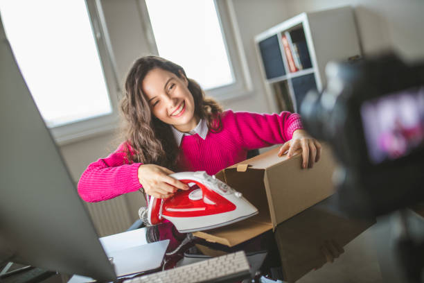 istock Young female influencer making a tutorial of new iron 1291829623