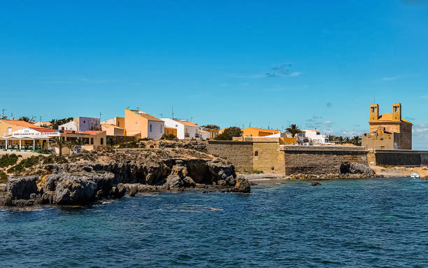 view from sea on buildings of tabarca island - island of tabarca imagens e fotografias de stock