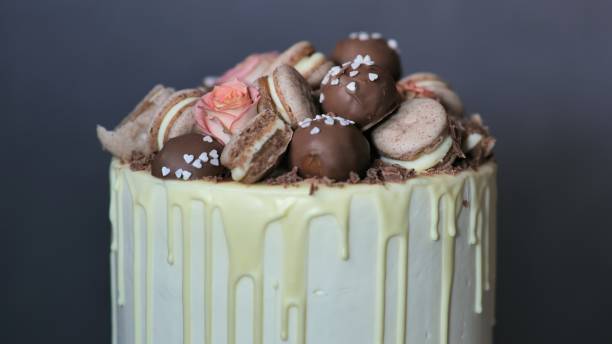 istock White cheese glaze cake with cookies on top 1291832733