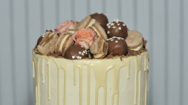 istock White cheese glaze cake with cookies on top 1291832738