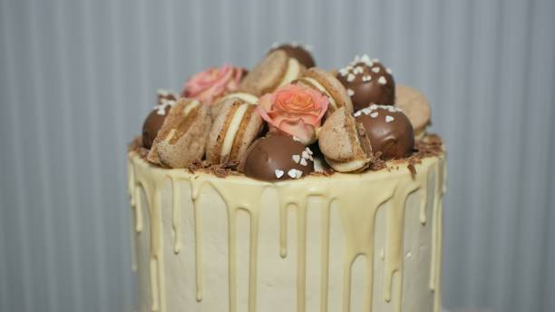 istock White cheese glaze cake with cookies on top 1291832742