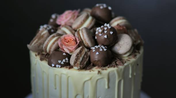 istock White cheese glaze cake with cookies on top 1291833154