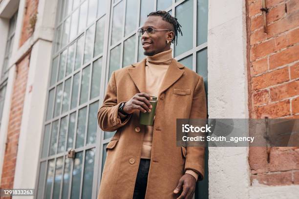 Modern Africanamerican Man Drinking Take Away Coffee Outdoors In The City Stock Photo - Download Image Now