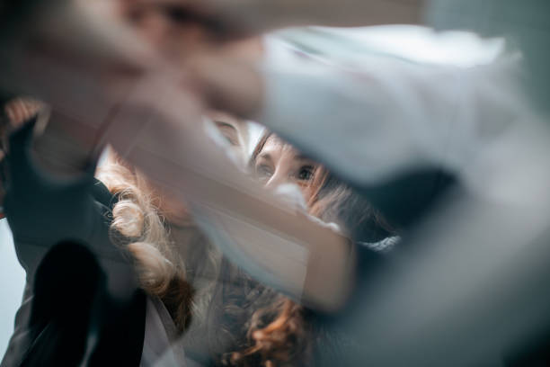 istock close up. business people joining their hands together 1291834429