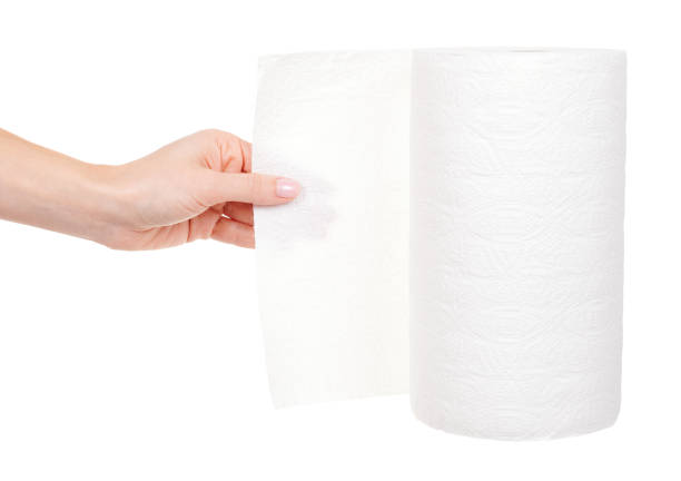 istock Hand with roll of paper towel isolated on white background. 1291836496