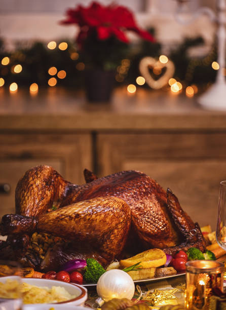 istock Traditional Stuffed Christmas Turkey with Side Dishes 1291837506