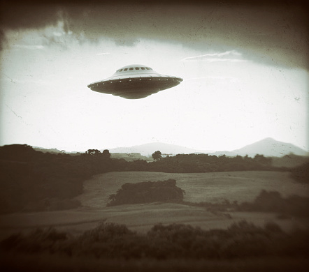 Unidentified Flying Object. Concept of old photo. 3D illustration imitating old photography of UFO.