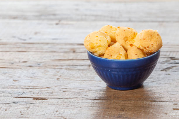 istock Brazilian food, cheese bread. Snake Food. On a rustic table. 1291839514