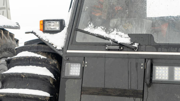 istock All-terrain vehicles on a winter background. Powerful off-road transporter. Engine, cross. Adventure concept. 1291841002