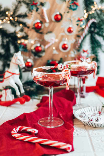 istock Festive Cranberry Cocktail for Christmas with mistletoe 1291842101