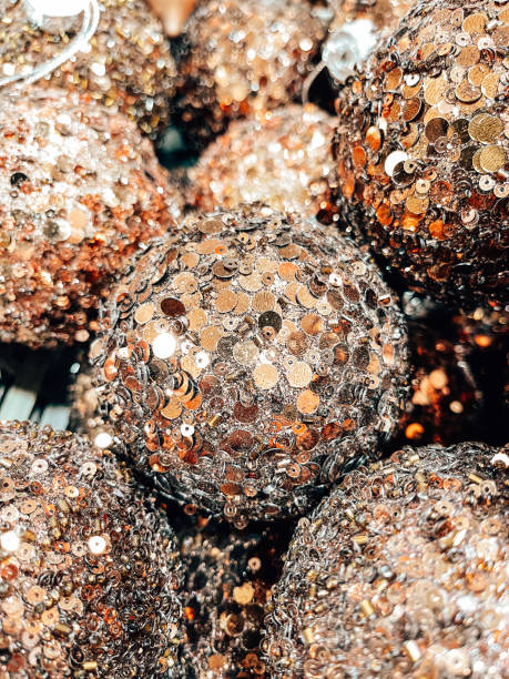 istock gold christmas baubles background 1291844265