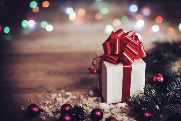 istock Christmas gift box with Christmas decorations and snow cones 1291844286