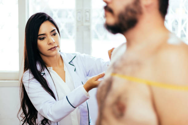 istock Dietitian attending to patient at her clinic 1291850683