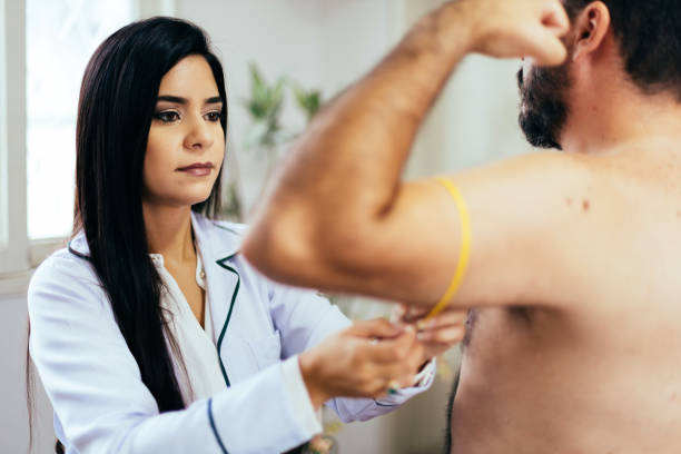 istock Dietitian attending to patient at her clinic 1291850690