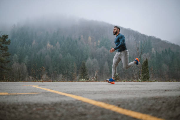 istock Male Athlete Practicing Sprints Outdoor. 1291853068