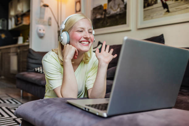 istock Young woman is communicating via video call at home 1291854004