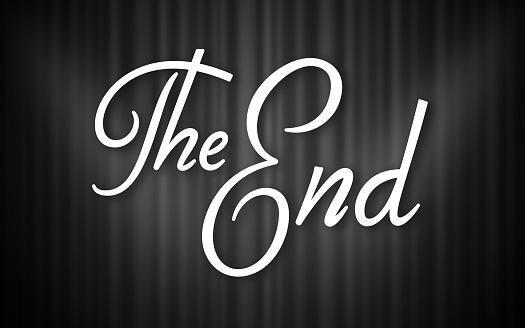 The End script text against a gray black and white retro curtain.