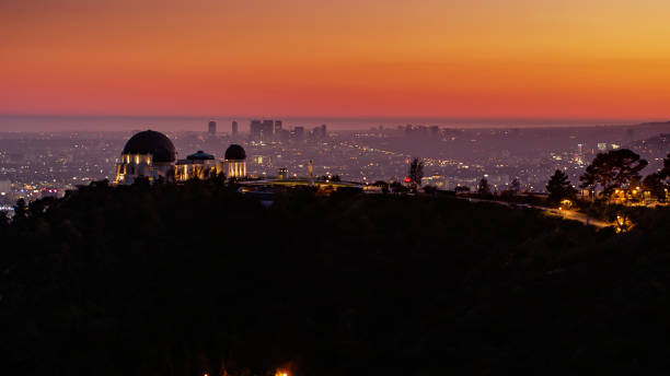 istock Griffith Park Observatory lit Up at Sunset with Westside of Los Angeles Beyond 1291856860