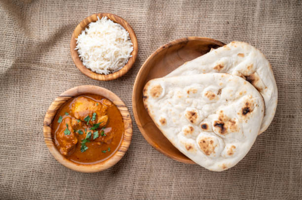 istock butter chicken curry with naan and basmati rice 1291861196