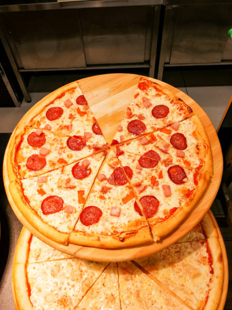 istock Tomato and Cheese Sausage Pizza Cooked Today 1291861271