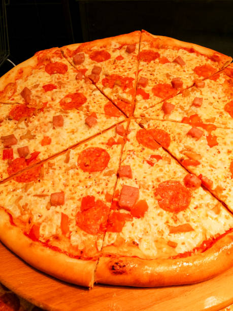 istock Tomato and Cheese Sausage Pizza Cooked Today 1291861278