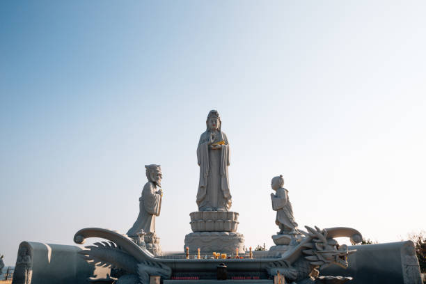 istock Buddha statue at Huhuam temple in Yangyang, Korea 1291862221