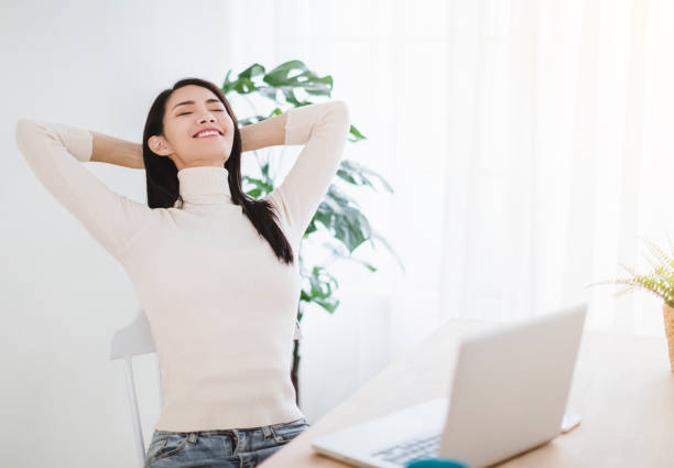 istock beautiful woman working on a laptop. freelancer,work from home concept. 1291864494