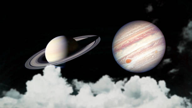 istock Saturn and Jupiter rise back silhouette cloud on the night sky 1291869041