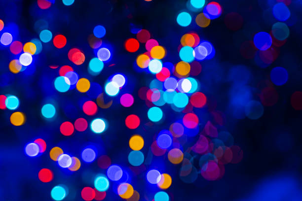 istock Holidays' spirit. Vibrant abstract background - bokeh, created by defocusing technique based on illumination. 1291873654
