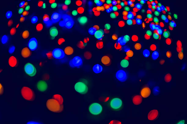 istock Holidays' spirit. Vibrant abstract background - bokeh, created by defocusing technique based on illumination. 1291873667