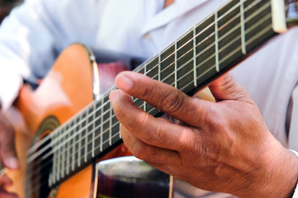 istock Man playing an acoustic guitar 1291873779